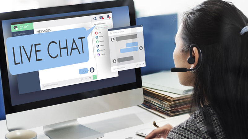 A customer service representative providing assistance through live chat services to customers.